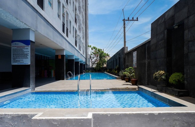 Trendy and Tidy Studio Room at Puri Mas Apartment