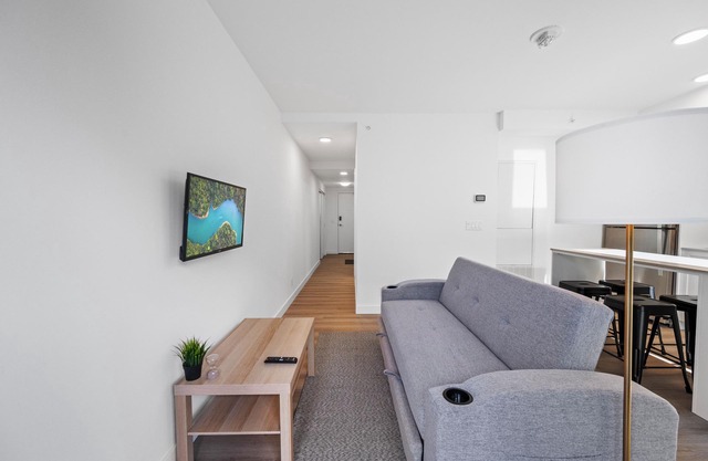 Mins to Stampede | Rooftop Patio | Sofa Bed | Underground Parking