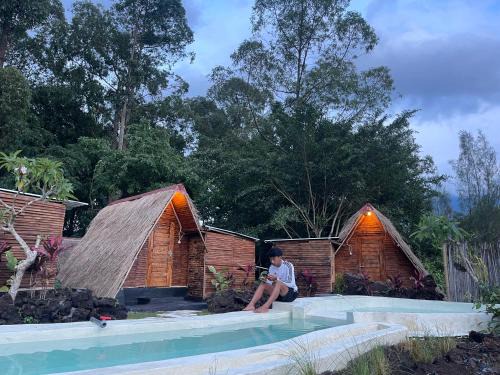 Triangular house and hot spring