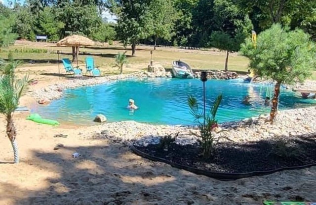 Tropical Oasis located on trails on 10 private acres. Outdoorsman Paradise