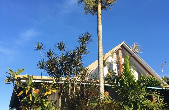 Tropical pole home near the beach.