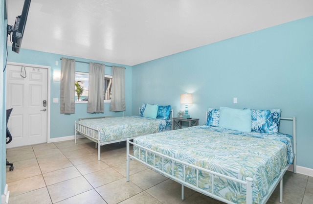 Tropical Two Queen Bed Room at Fort Myers Beach