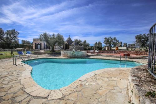 trullo degli ulivi con piscina e vasca per bambini