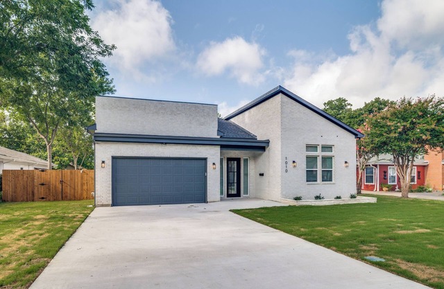 Tucked away New construction Home near Garland Downtown area