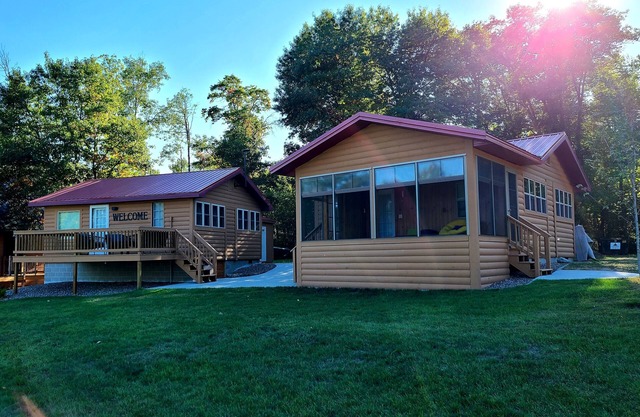 Two cabins right on the lake for the perfect family getaway.