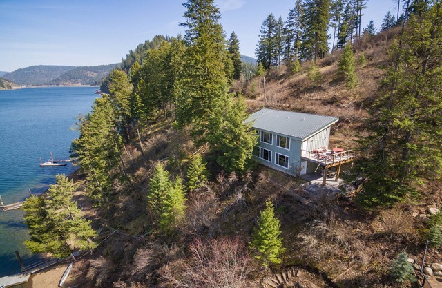 Two dog-friendly, lakefront homes with a private hot tub & decks