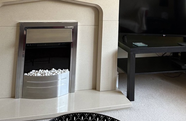 Two-minute walk to town centre, 7-minute walk to train station .