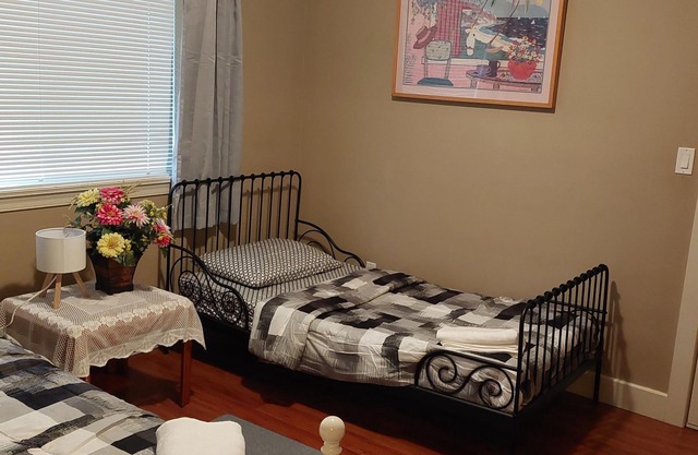 Two Private Rooms with One Private Bathroom. Private Entrance and Kitchenette.