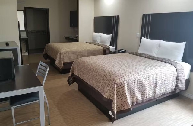 Two Queen Non-Smoking Room, Scottish Inns and Suites Bay City TX, Free Parking