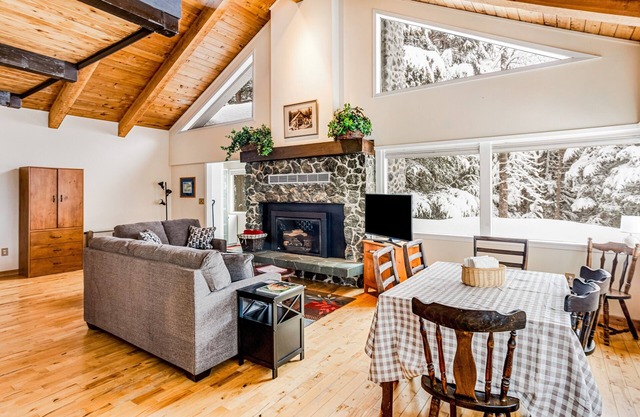 Two-story, dog-friendly retreat with deck, fireplace, W/D, & mountain view
