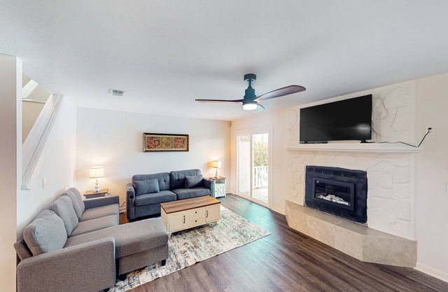 Two-story waterfront retreat with a furnished deck, washer/dryer, & AC