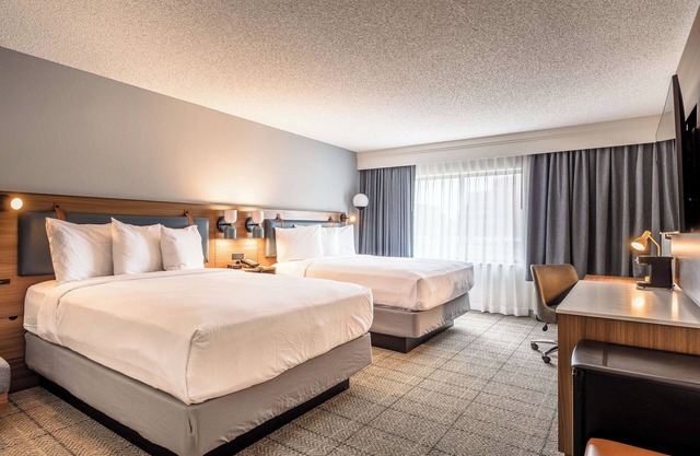 Two Units Just Minutes Away From Eagle Stadium, w/ FREE Parking & Outdoor Pool!