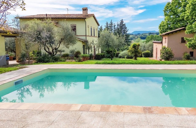 Typical Le Marche region house surrounded by lush greenery, perfect for holidays and relaxation!