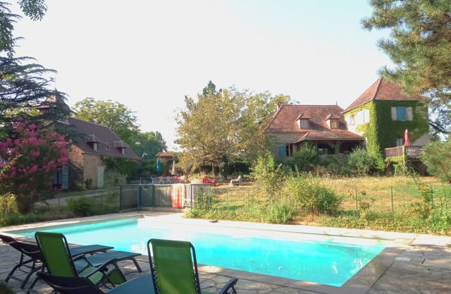 Typical stone houses with pool surrounded by beautiful countryside