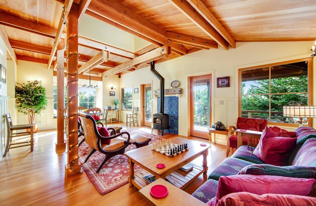 Unique coastal retreat boasting ocean views, spacious deck, lofted layout & WiFi