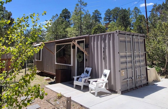 Unique shipping container with hot tub.