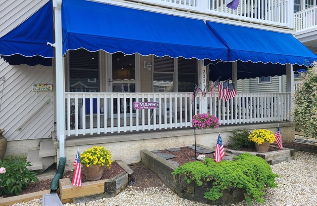 Updated 1st floor fully furnished Duplex one block off beach!