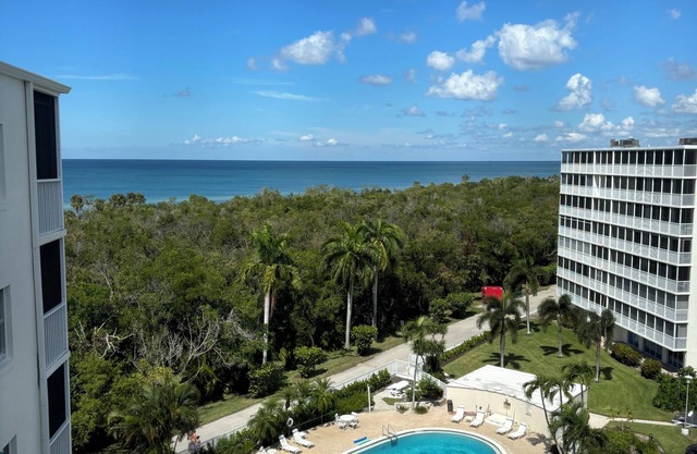 Updated 8th floor 1 bedroom 2 full bath condo steps away from Vanderbilt Beach.