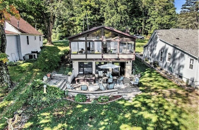 Updated and fully appointed Round Lake waterfront home w/ hot tub!