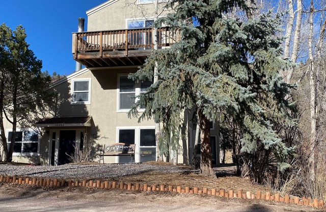 Updated creekside cabin with WiFi, hot tub, & fireplace - near lake and town
