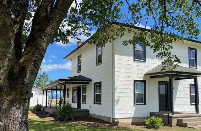 Updated historical home with large porch & great views