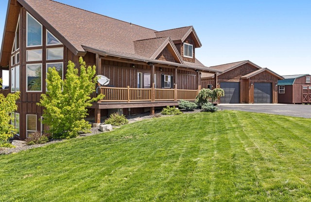 Updated, mountain-view retreat with private hot tub, game room, deck & firepit