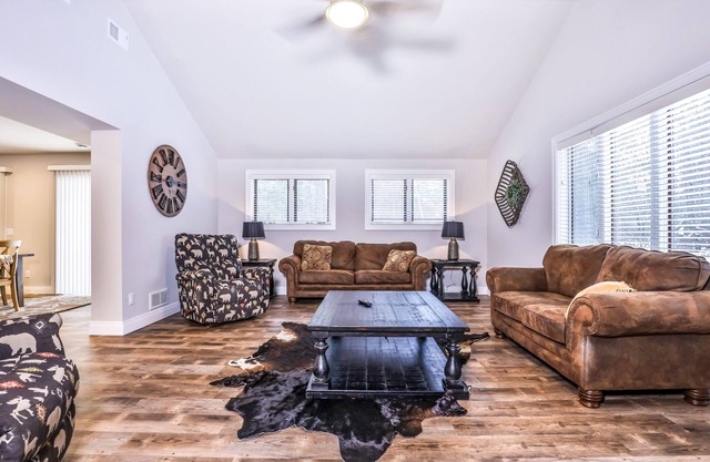 Updated, tree-lined home on the snowmobile trail with gas fireplace & firepit