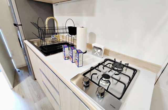 Elegancia Urbana: Amplio Loft con Cama King