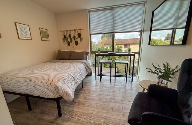 Urban studio unit with patio views, shared lounge space and dedicated workspace