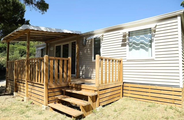 Ushuaïa Villages Camping Figurotta *** - Prestige mobile home 40m² - 3 bedrooms + air conditioning + TV + Covered Terrace 8 people
