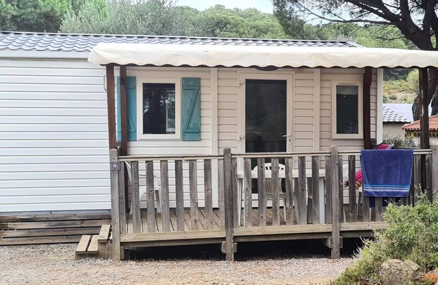 Ushuaïa Villages Camping Figurotta *** - Mobile home La Garigue 23m² - 2 bedrooms + Air conditioning + TV + Covered terrace 4 people