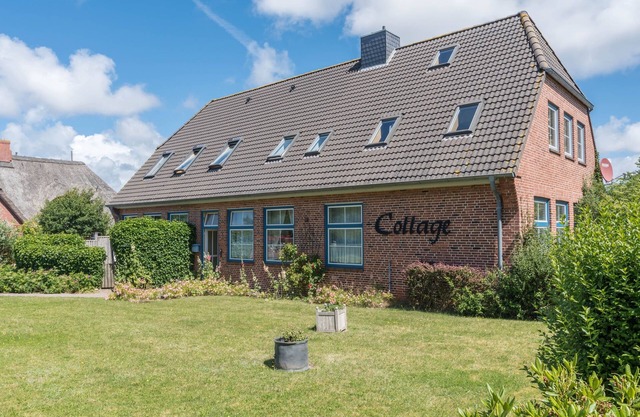Apartamento de vacaciones "Cottage am Watt" en la Marisma con Wi-Fi y terraza