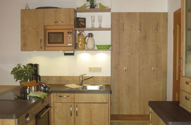 Casa de huéspedes de arriba (45 m²) 2 dormitorios, cocina, ducha / WC, balcón
