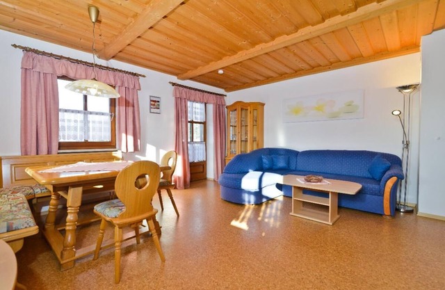 Vacation apartment with balcony, two terraces and a large sunbathing lawn