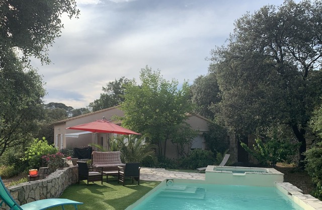 Holiday rental in lush greenery and swimming pool