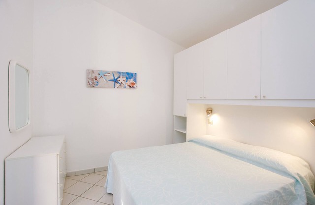 Casa de vacaciones "Appartamento Della Sughereta" con vistas al mar, terraza y Wi-Fi