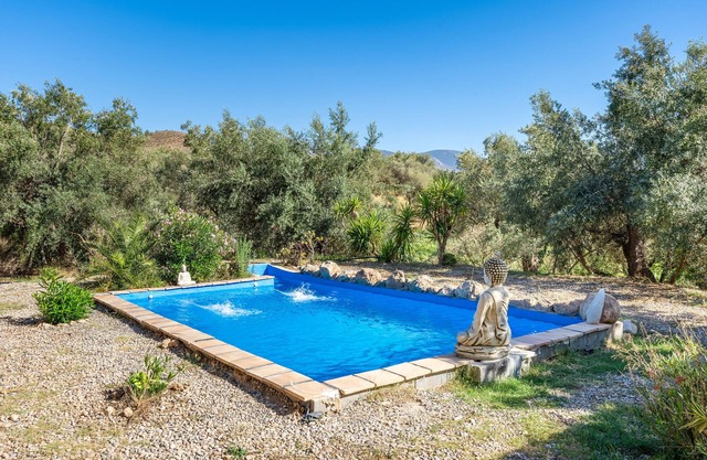Casa de vacaciones "Cabaña Shadú" con vistas a la montaña, piscina compartida y Wi-Fi
