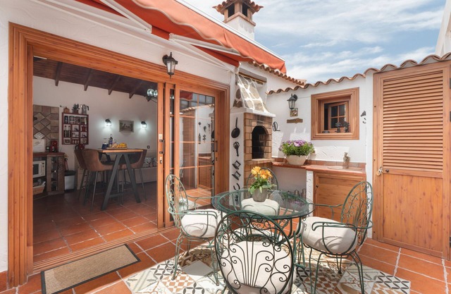 Casa de vacaciones 'La Casita De Conchita' con vistas al mar, Wi-Fi y aire acondicionado