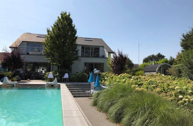Vakantievilla met zwembad, wellness en glamping in Paal/Beringen