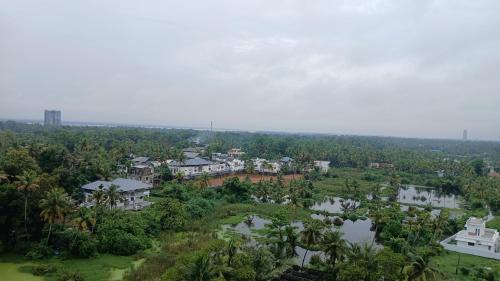 Veu Ragamalika Apartment with Fully Equipped Kitchen, Balcony & Caretaker