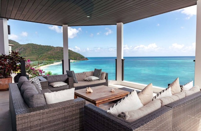 Vibrant Beachside Retreat Near Ffryes Beach with Breathtaking Sunsets Daily