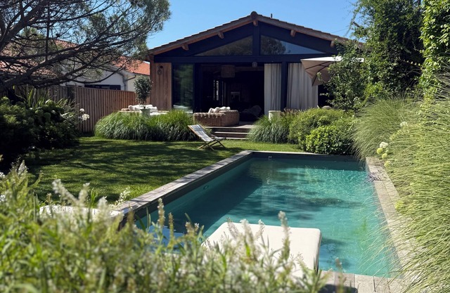 Villa and outbuilding with pool and garden