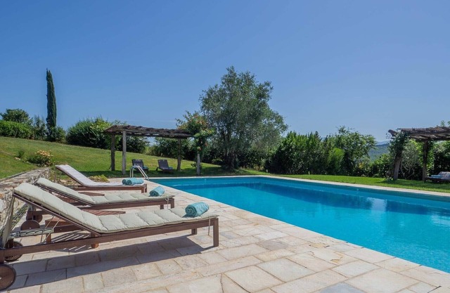 Villa Badia a Corte with private pool, surrounded by greenery, maximum privacy.