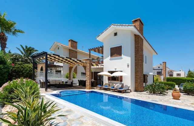 Sea Front Villa Costa Blu by Ezoria Villas