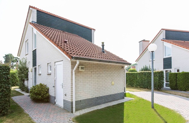 Villa en Arcen con ducha solar y jardín