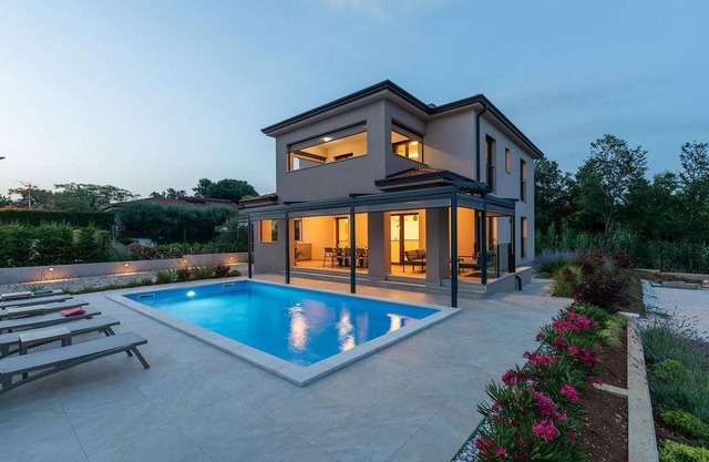 Villa Karina is a newly built holiday home with pool near town of Porec and the beach.