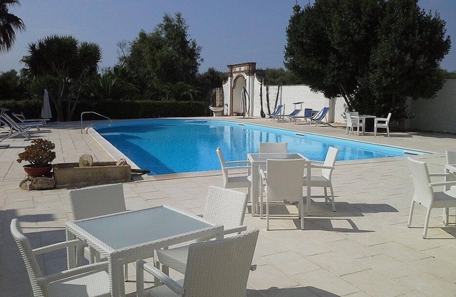 Villa Lippia B: Un apartamento característico y acogedor que forma parte de una villa de dos pisos en el estilo característico de la campiña de Apulia.
