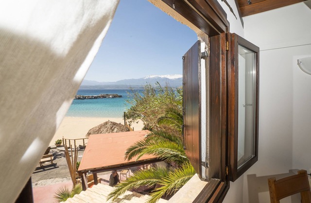 Villa Marathoula, frente a la playa, vista al mar, a pocos pasos del agua! duerme 4+
