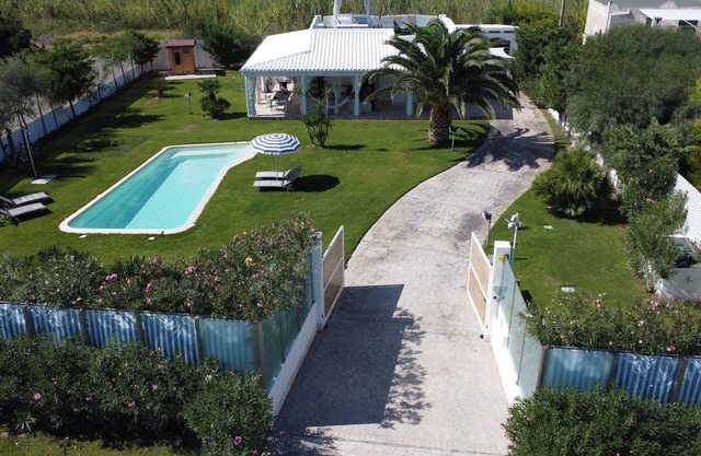 Villa "Miami Vieste" cerca de la playa con piscina privada y Wi-Fi