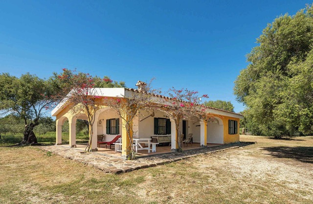 Casa vacacional con aire acondicionado, terraza y jardín